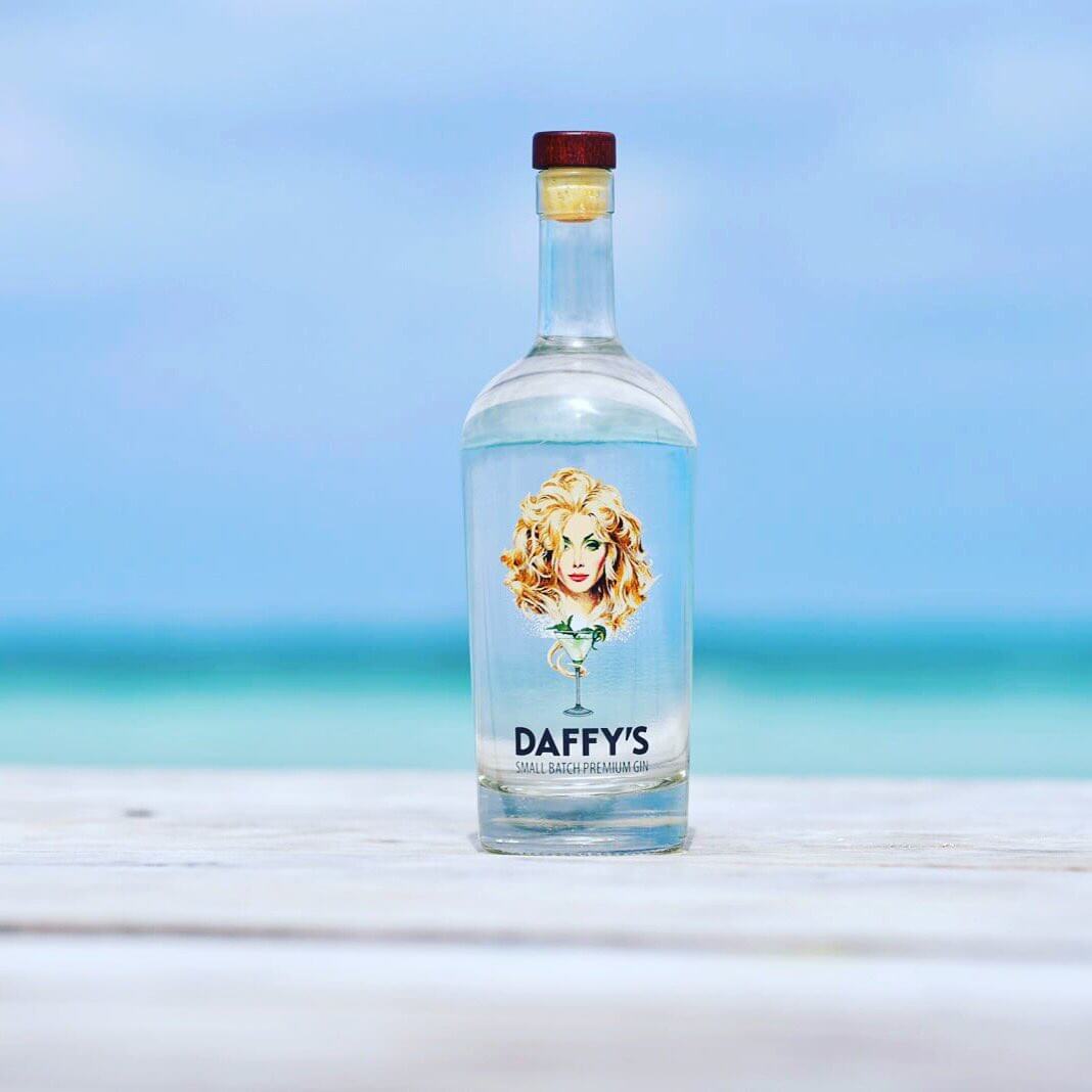 Daffy’s Gin Bottle on a beach Daffy’s Gin Bottle on a beach